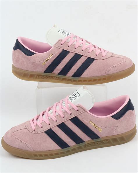 pink and blue Adidas sneakers